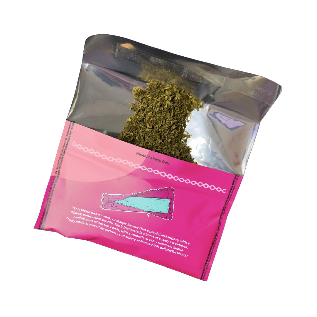 Pink packaging with cannabis buds on a white background