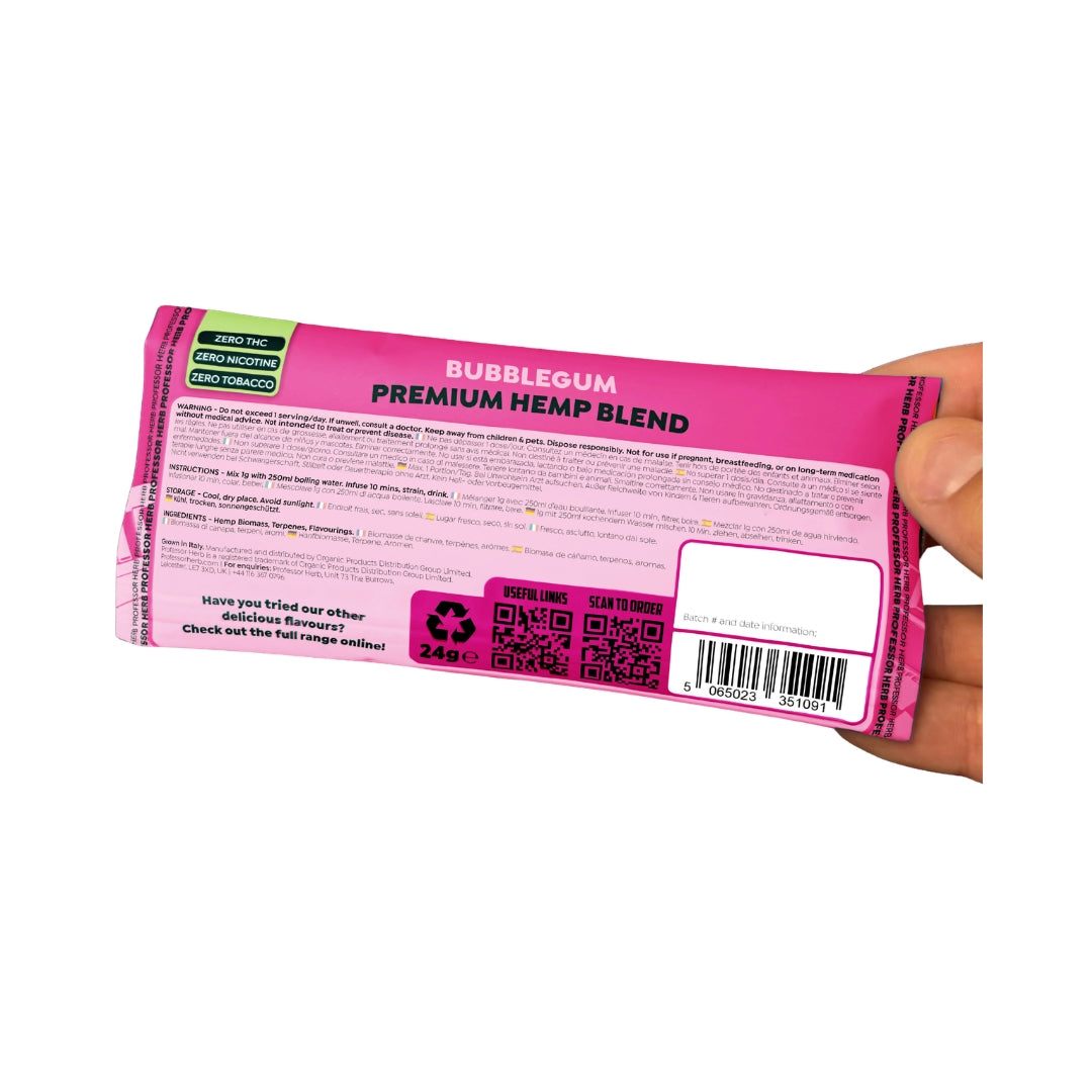Pink packaging of bubblegum with 'Premium Hemp Blend' text, held by a hand.